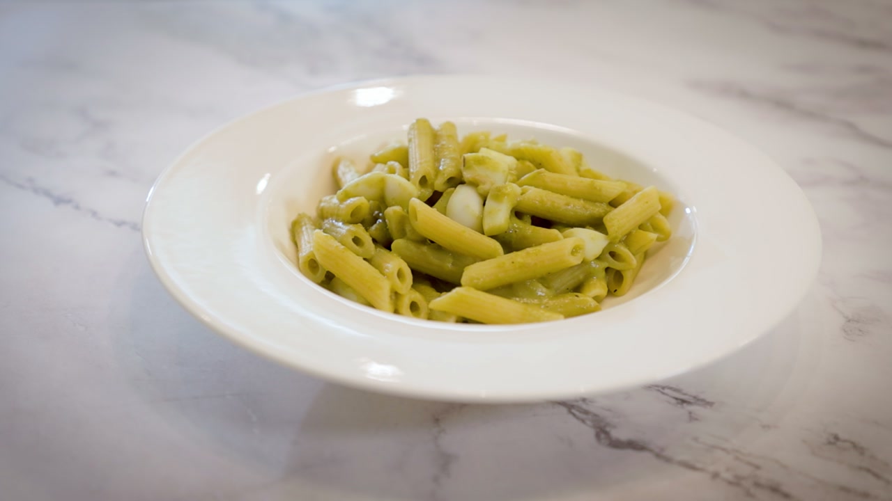Penne with pea cream and cuttlefish